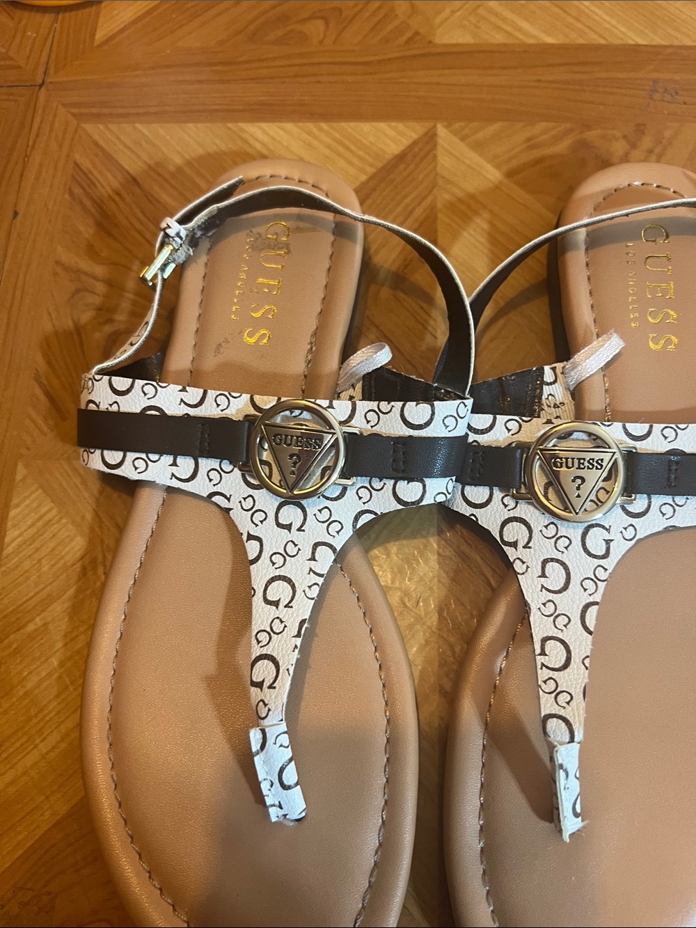 GUESS White & Black Logo T-Strap Sandals with Gold Hardware